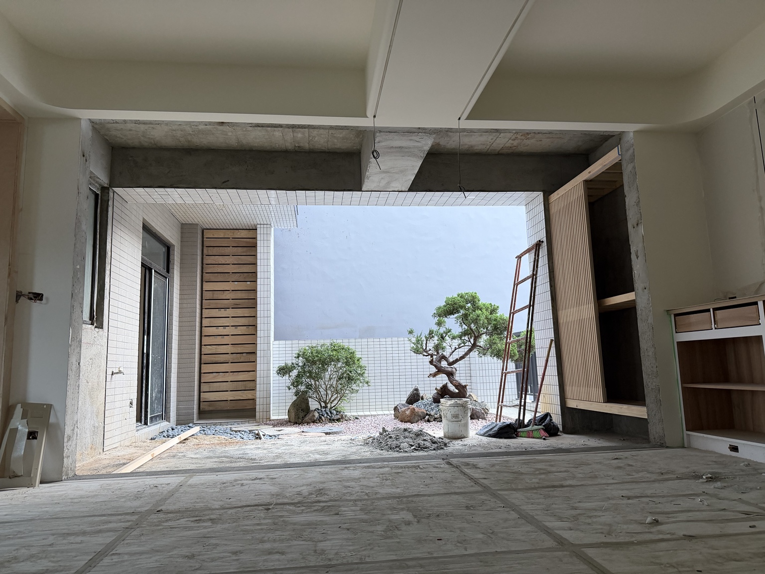 Courtyard and interior woodwork under construction